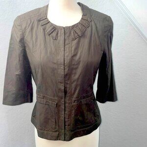 Tahari dark green olive fully lined jacket w/ruffle detail & two front pockets.6